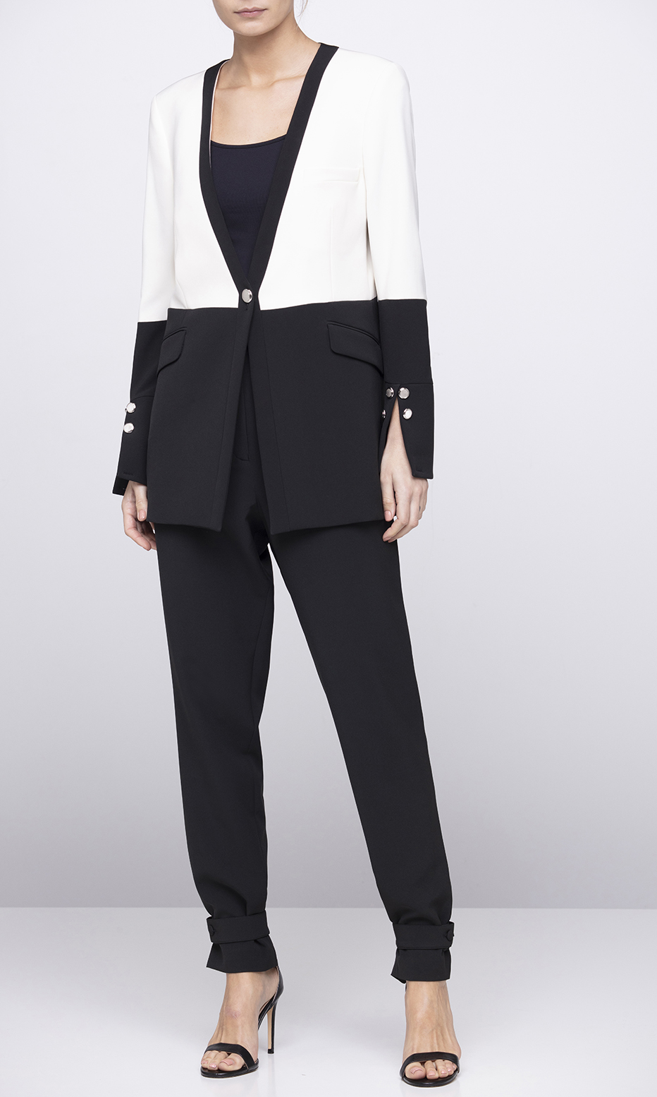 lapel-less black and white structured blazer